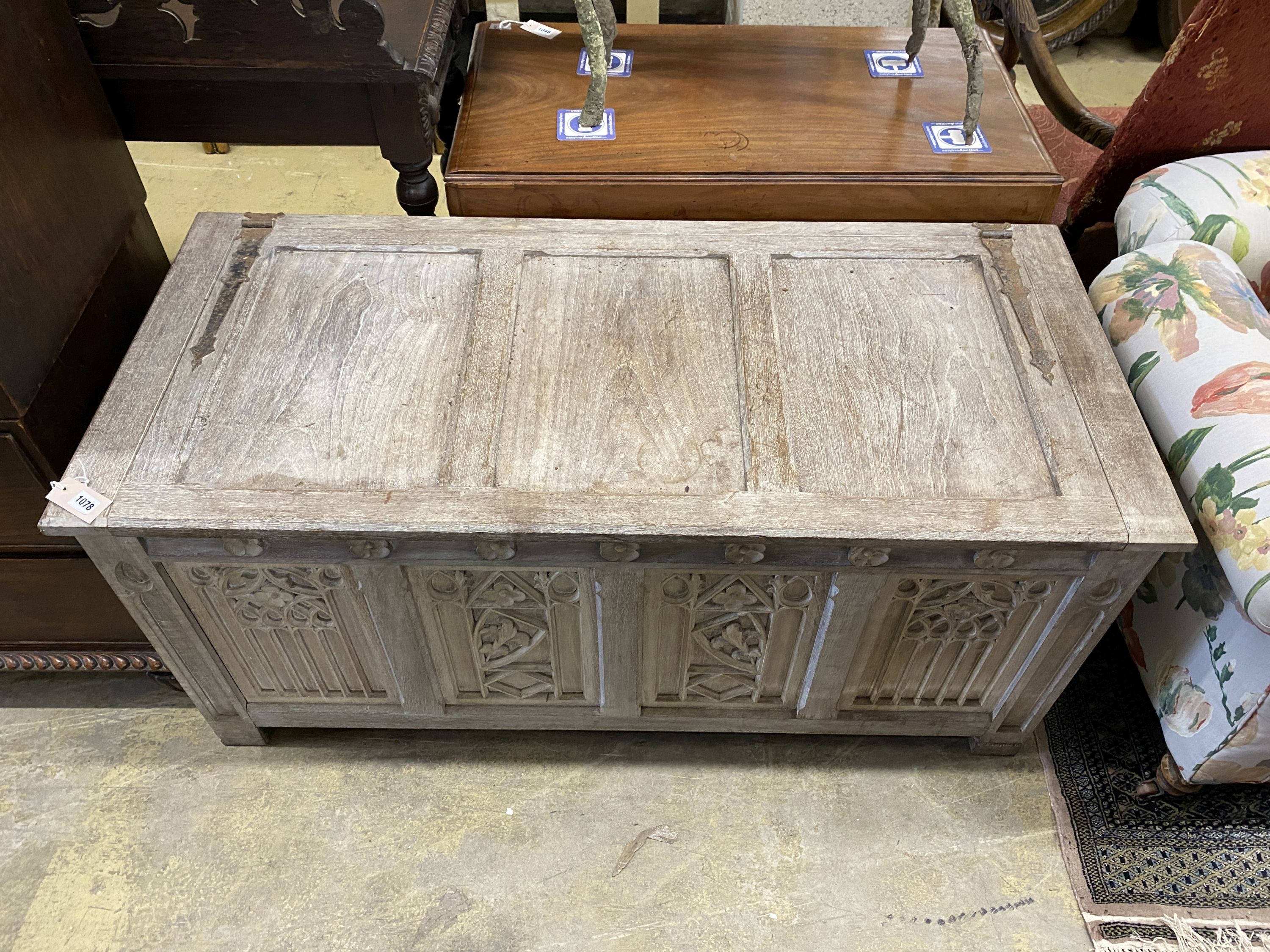 A 17th century style bleached oak coffer, length 136cm, depth 61cm, height 63cm